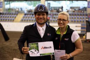 Shane Rose is presented with the major prize – 2 tickets to Normandy and the Alltech FEI World Equestrian GamesTM, after his performance on Contenda in the Alltech CIC2* – by Emma Browne, Marketing Manager, Alltech Australia. Photo: Rhys Carleton-Carlos, whythelongfaces.com